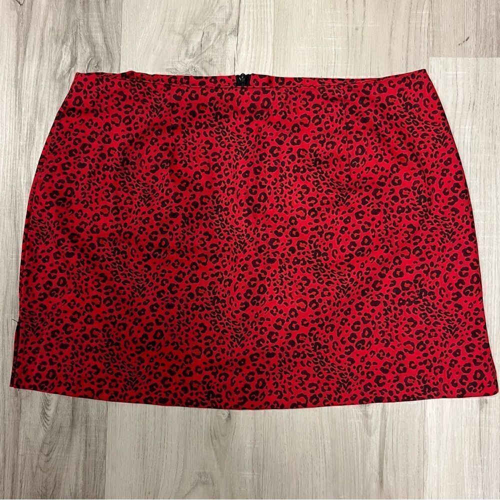 NWOT vintage y2k red black animal print mini skirt by I.L.U. Slight stretch sz11